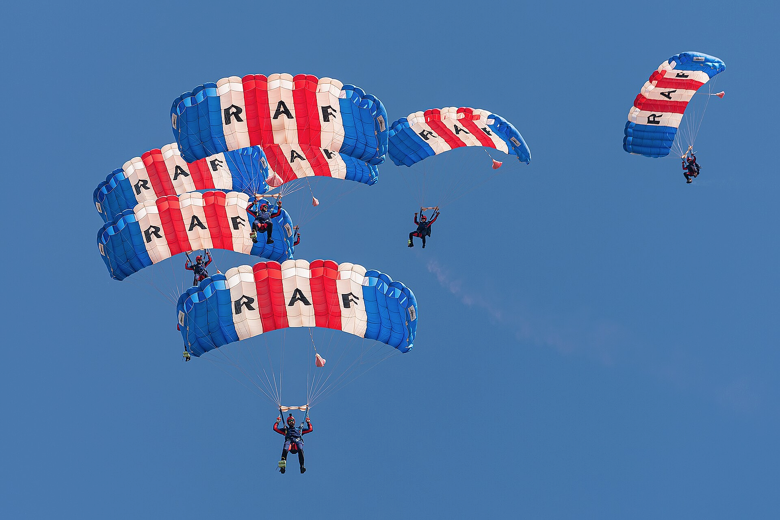 Royal Air Force Falcons parachute display team at the Royal International Air Tattoo 2024.