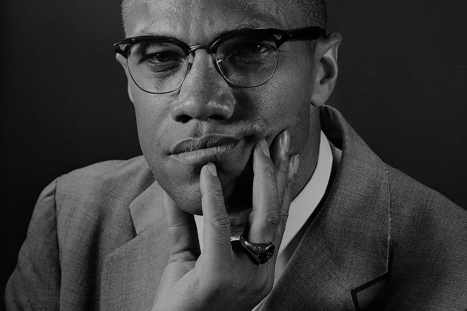 Original caption by the Associated Press: MALCOLM X DEFECTS-Outspoken Malcolm X, a Black Muslim advocate of racial separation, has defected from the parent organization to form his own mosque. He said "I am still a Muslim... I intend to work on my own among America's 22 million non-muslim Negroes to convert them from non-violence to active self-defense against white supremacists..."