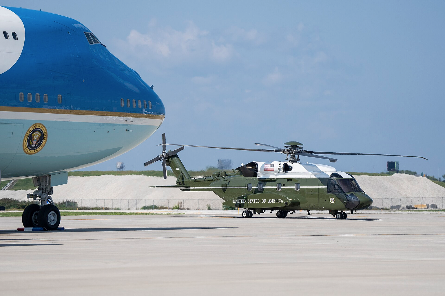 Marine One, with President Joe Biden and First Lady Jill Biden aboard, taxis past Air Force One at Chicago O’Hare International Airport, Monday, August 19, 2024, en route to the Soldier Field landing zone in Chicago, Illinois. (Official White House Photo by Adam Schultz)