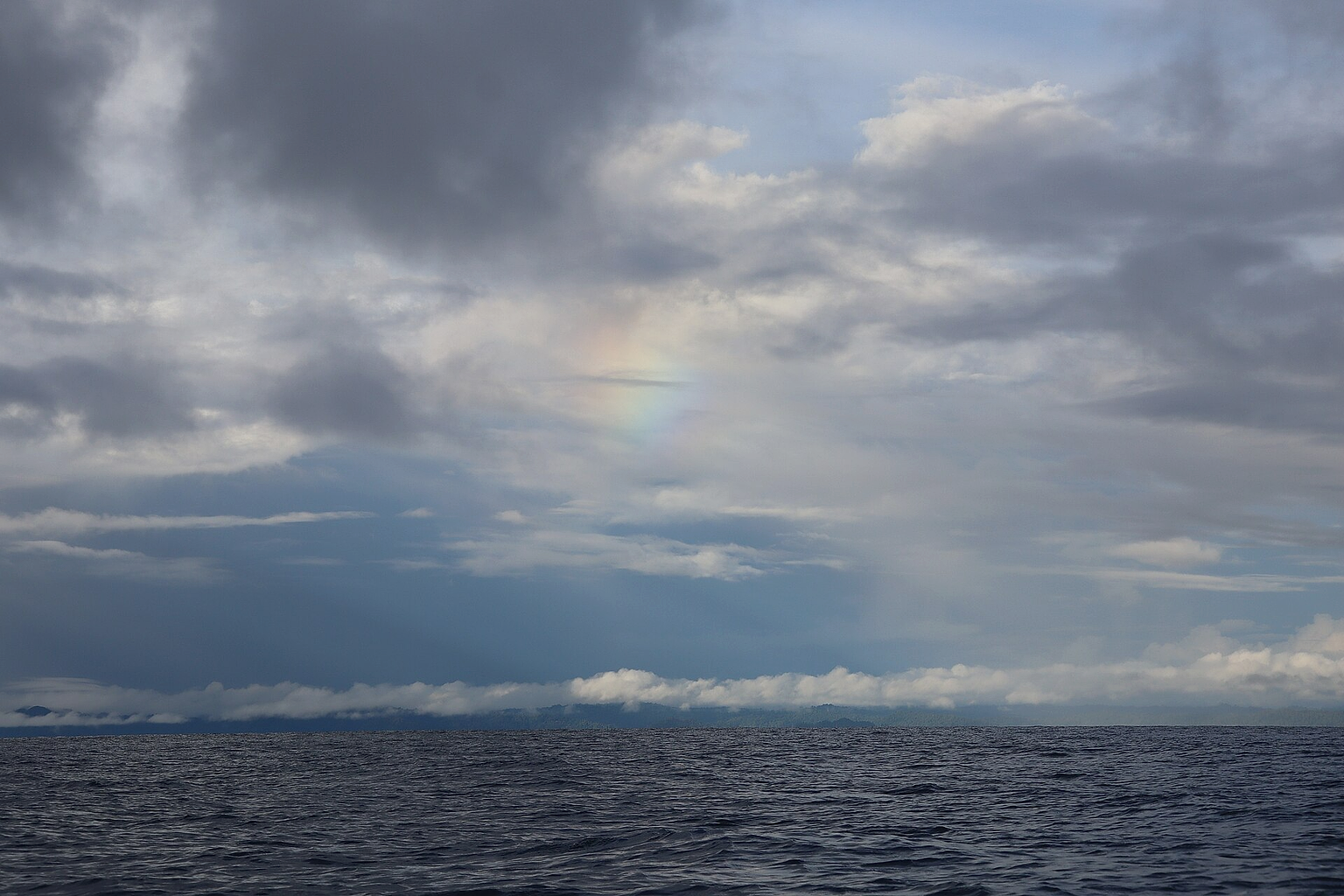 Rainbow over Pacific Ocean in Nuquí, Chocó, Colombia.