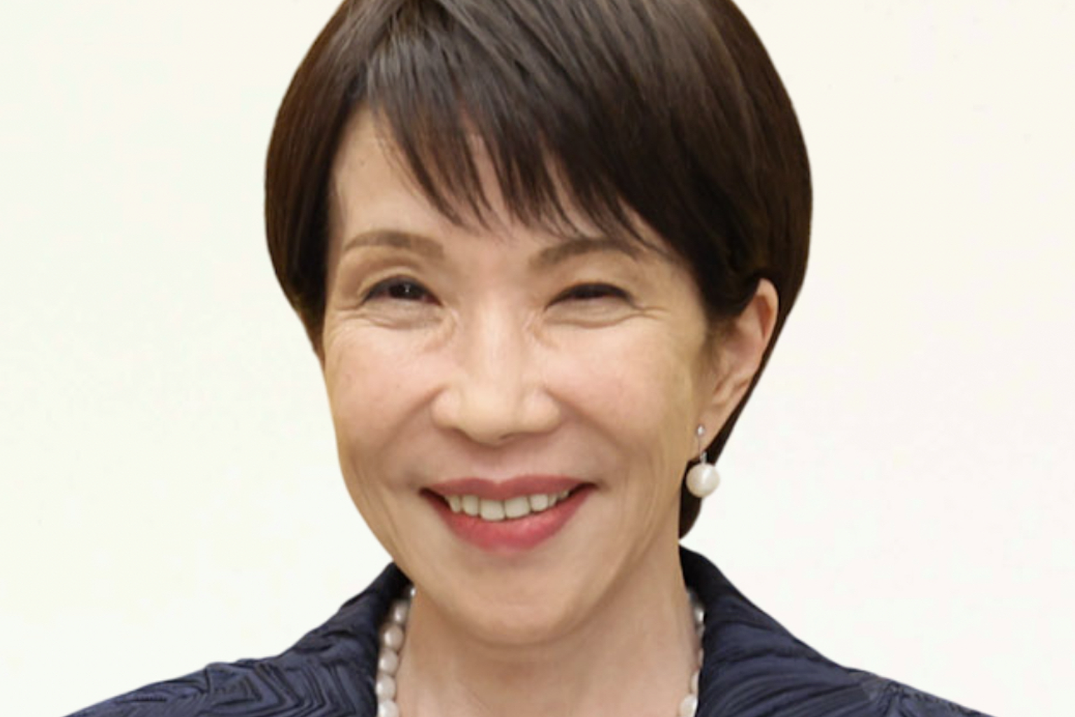 Edited Portrait of the Prime Minister of Japan, Sanae Takaichi. Based on https://commons.wikimedia.org/wiki/File:Sanae_Takaichi_October_2025_(3x4_cropped).jpg