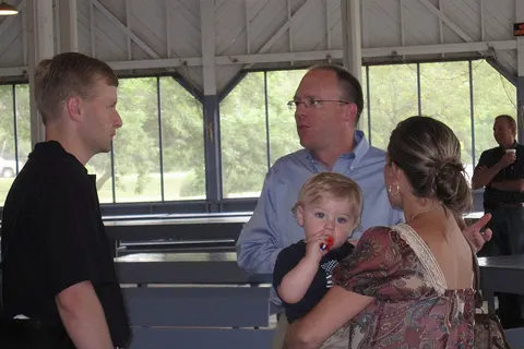 State Rep. Christopher Rants, R-Sioux City, visits with a family before the event