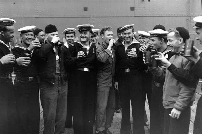 US and Soviet sailors in Alaska celebrate VJ day.