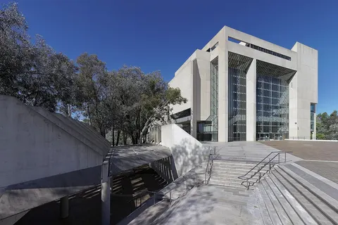 The High Court of Australia, in Canberra ACT, is an unusual and distinctive structure, built in the brutalist style, and features a public atrium with a 24-metre-high roof. The building was completed in 1980. The High Court was added to the Australian National Heritage List in November 2007. This image was stitched from a series of six 24mm images, taken without the use of a pano-head.