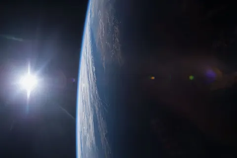 From the International Space Station, Expedition 42 Flight Engineer Terry W. Virts took this photograph of the Gulf of Mexico and U.S. Gulf Coast at sunset. The space station and its crew orbit Earth from an altitude of 220 miles, traveling at a speed of approximately 17,500 miles per hour. Because the station completes each trip around the globe in about 92 minutes, the crew experiences 16 sunrises and sunsets each day.