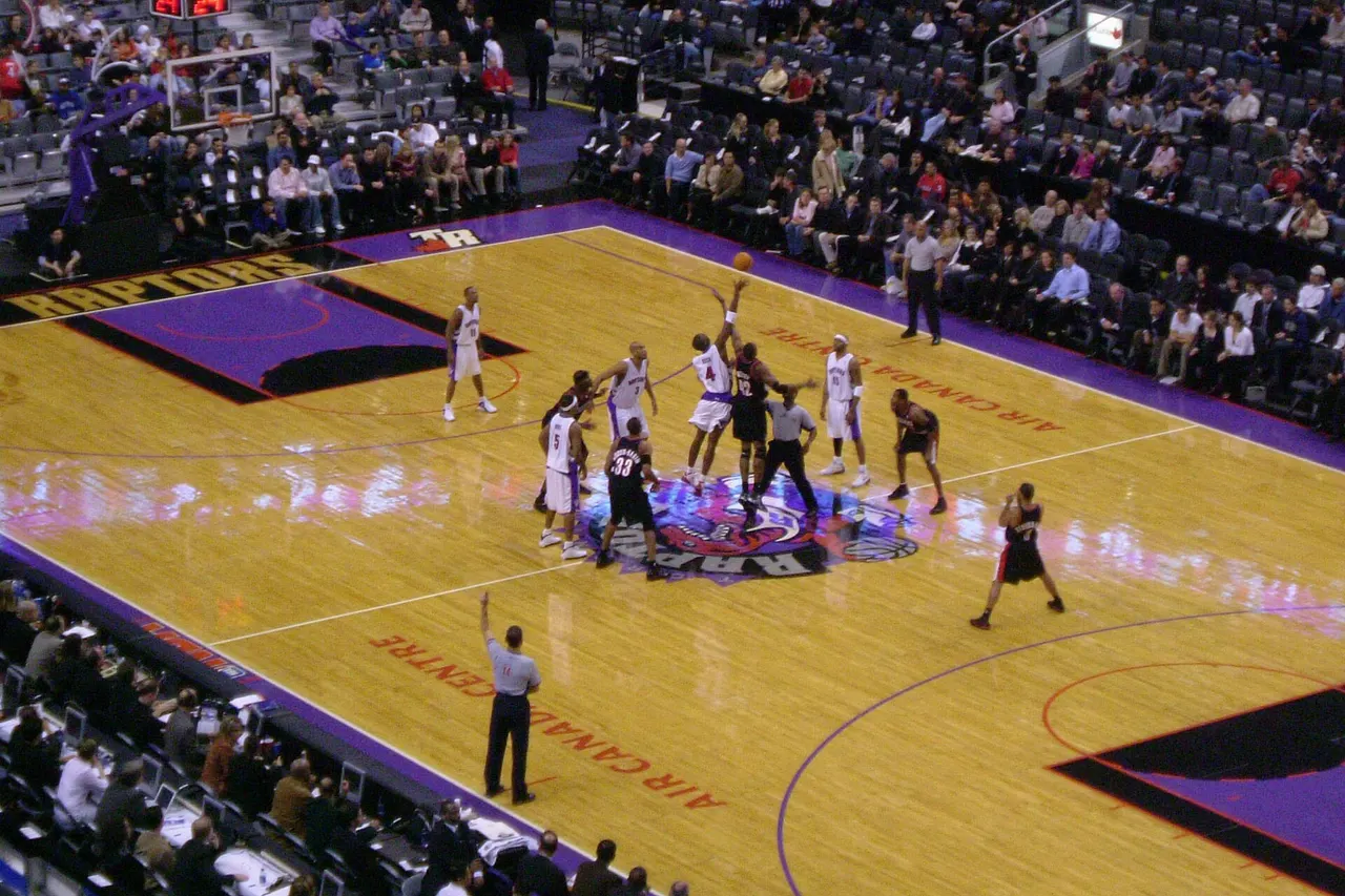 jump ball at a preseason portland trail blazers at toronto raptors game