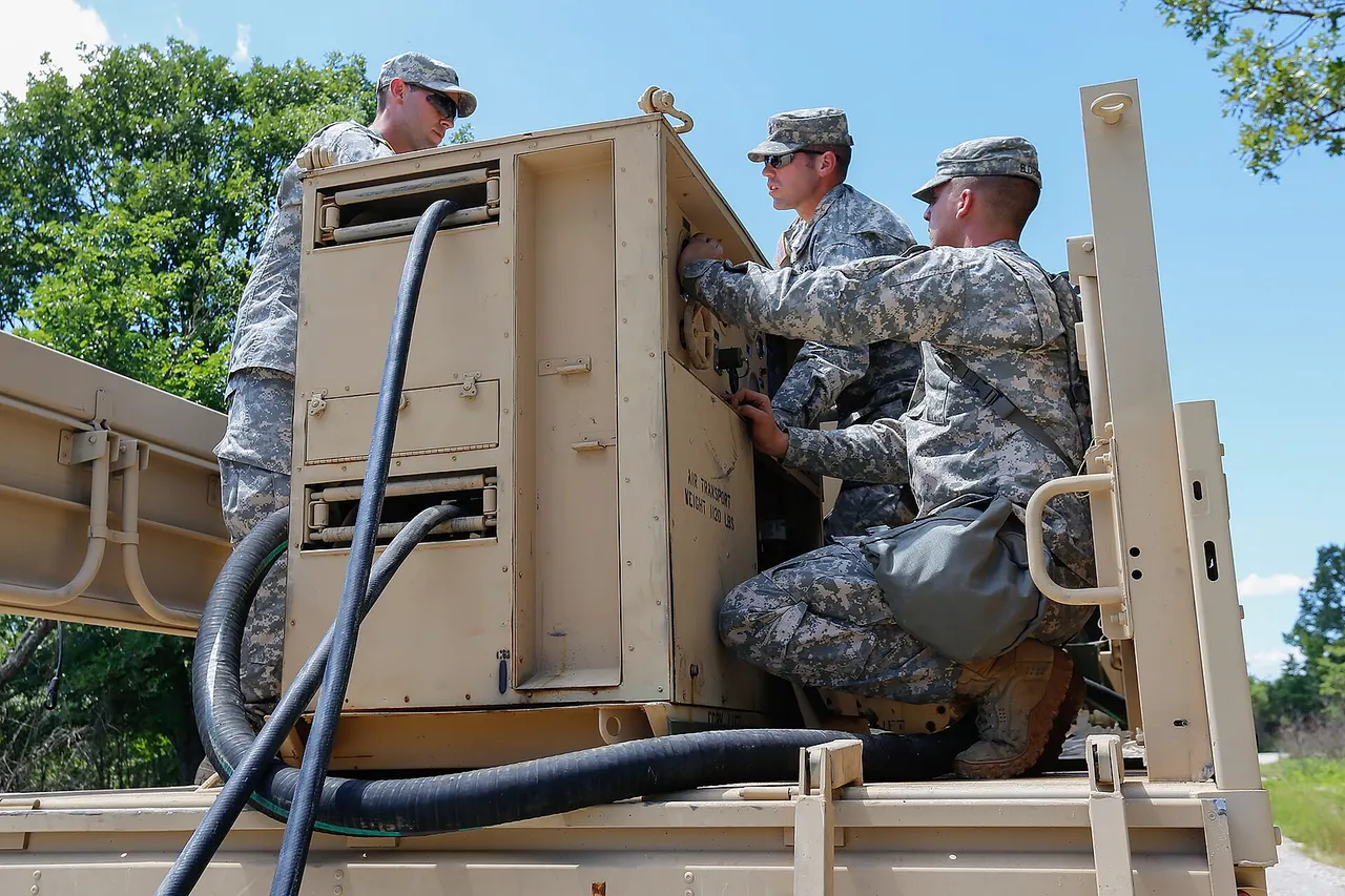 Spc. Dominic Ashley, Spc. Casey Shockey, and Pfc. Austin Eldridge, assigned to the 3175th Chemical Company, 835th Combat Sustainment Support Brigade, work together to set up an M12A1 Power Driven Decontamination Apparatus in preparation for a decontamination exercise during annual training on June 8, 2015 at Fort Leonard Wood, Mo. Soldiers manned five stations, three equipped with PDDAs, to clean and decontaminate vehicles after a simulated chemical attack. (U.S. Army photo by Pfc. Samantha J. Whitehead) Unit: 70th Mobile Public Affairs Detachment