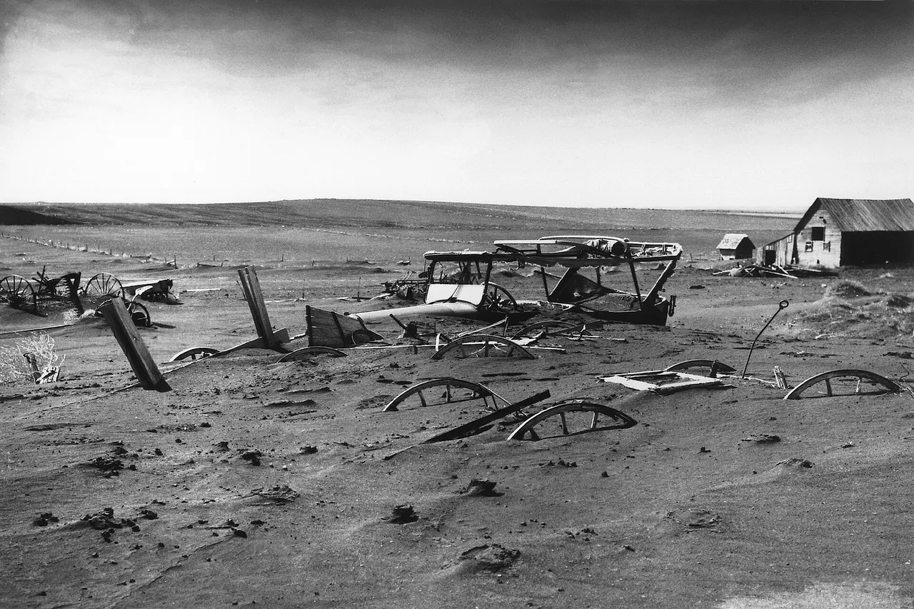 Buried machinery in barn lot in Dallas , South Dakota , United States during the Dust Bowl , an agricultural, ecological, and economic disaster in the Great Plains region of North America in 1936