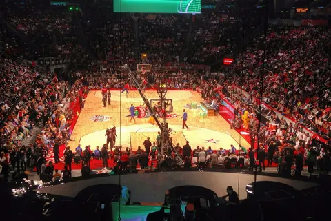Spectators inside the Toyota Center await the start of the NBA Slam Dunk contest on Saturday, Feb. 16, 2013.