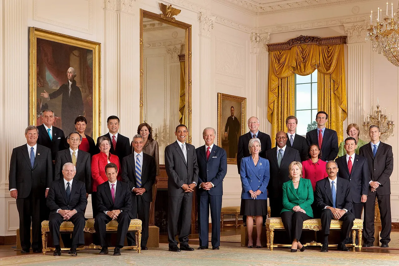 First Cabinet of President Barack Obama in the White House East Room . From left to right: Back row: Secretary of Transportation Ray LaHood , Administrator of the Environmental Protection Agency Lisa P. Jackson , Secretary of Commerce Gary Locke , Secretary of Labor Hilda Solis , President Barack Obama , Vice President Joe Biden , Secretary of Interior Ken Salazar , Secretary of Housing and Urban Development Shaun Donovan , Director of the Office of Management and Budget Peter R. Orszag , Chair of the Council of Economic Advisers Christina Romer , Secretary of Education Arne Duncan . Second row: Secretary of Agriculture Tom Vilsack , Secretary of Energy Steven Chu , Secretary of Homeland Security Janet Napolitano , Chief of Staff Rahm Emanuel , Secretary of Health and Human Services Kathleen Sebelius , United States Trade Representative Ron Kirk , United States Permanent Representative to the United Nations Ambassador Susan Rice , Secretary of Veteran Affairs Eric Shinseki . Third row, sitting: Secretary of Defense Robert Gates , Secretary of Treasury Timothy F. Geithner , Secretary of State Hillary Rodham Clinton , Attorney General of the United States Eric Holder .
