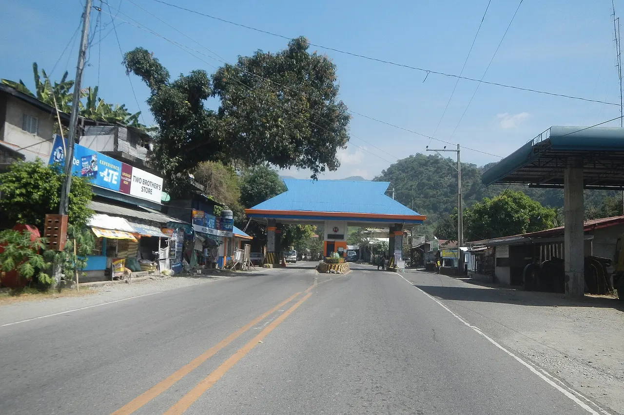 Kennon Road Kennon Road (Tabaan Sur-Camp One-Twin Peaks-Camp 3, Tuba, Benguet section) Dungon, Sison, Pangasinan Tabaan Sur, Tuba, Benguet Camp 1 Tollgate Camp 1-Indaoc Twin Peaks Provincial Road KM 216.783 - Km. 232+383 15.600 kilometers Camp One, Tuba, Benguet Sitio Klondykes Camp 1 Bridge K0 216+090 Bridal Veil Falls at Sitio Taroy, Camp 3 View Deck Along Kenon Road Footbridge to Tukang Cave Bridal Veil hanging bridge Twin Peaks, Tuba, Benguet Twin Peaks Bridge K0 221+078 Colorado Bridge K0 221+400 Twin Peaks National High School Camp 3, Tuba, Benguet Maintenance of Kennon Road K0 214+(-613) - K0214+(-113) P 4.854 million Welcome-border arch-signs of Benguet Province & La Union Province Welcome-border arch-signs of Benguet Province (Camp 1, Tabaan Sur, Tuba) & La Union (Saytan, Pugo) Bued River Basin (Pugo, La Union - Tuba, Benguet) Bued River System Kennon Road (Camp 1, Tabaan Sur, Tuba, Benguet) K0 214+(-613) - K0216+158 Rehabilitation of the Flood Mitigation Structure along Bued River Basin in Camp 1, Tabaan Sur, Tuba, Benguet P 143.303 million from Pugo–Rosario Road Barangay Saytan 16.2481, 120.5065 Pugo, La Union bounded by Benguet boundary Barangay Tabaan Sur 16.2902, 120.5351 [1] Camp One, Tuba, Benguet 16.2576, 120.5727 [2] Twin Peaks, Tuba, Benguet 16.2972, 120.5701 [3] Camp 3 16.2970, 120.6269 [4] Tuba, Benguet bounded by Category:Sitios and puroks of the Philippines Subdivisions of the Philippines List of barangays in Pangasinan , Barangay Dungon, Sison, Pangasinan 16.2232, 120.5214 Sison, Pangasinan , Pangasinan Province located at at the south-western tip of both Benguet and the Cordillera Central (Luzon) surrounded served by the Bued River River valleys La Union 2nd District Engineering Office–Benguet 1st Engineering Office highway boundary Ilocos Region Cordillera Administrative Region boundary La Union Benguet boundary to Kennon Road roadway in Benguet (formerly the Benguet Road or Rosario–Baguio Road) part of National Route 54 (N54) of the Philippine highway network accessed from Roundabout Pugo–Rosario Road MacArthur Highway Subusub Rotunda (Pugo–Rosario Road-TPLEx access road) Tarlac–Pangasinan–La Union Expressway Section 3B (Sison-Rosario section) Tarlac–Pangasinan–La Union Expressway to North Luzon Expressway and SCTex from MacArthur Highway (Rosales, Pangasinan section) of MacArthur Highway or Manila North Road) Philippine highway network (Note: Judge Florentino Floro, the owner, to repeat, Donor Florentino Floro of all these photos hereby donate gratuitously, freely and unconditionally Judge Floro all these photos to and for Wikimedia Commons, exclusively, for public use of the public domain, and again without any condition whatsoever).