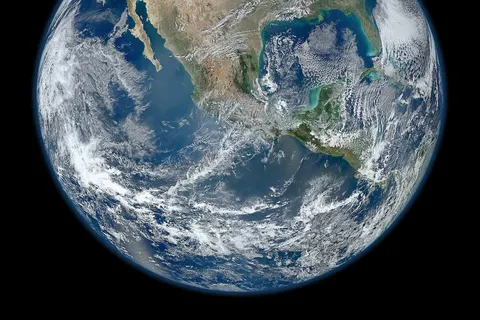 A view of most of North America taken from a low orbit of about 826 km altitude. The whole hemisphere is not visible owing to the low orbit , and the horizon is at a distance of about 3,300 km, while the radius of the planet is 6,371 km. The diameter seen from this height is about 125 degrees. An image of the Earth taken from the VIIRS instrument aboard NASA's Earth-observing research satellite, Suomi NPP. This composite image uses a number of swaths of the Earth's surface taken on 4 January 2012. The NPP satellite was renamed 'Suomi NPP' on 24 January 2012 to honour the late Verner E. Suomi of the University of Wisconsin. Suomi NPP carries five instruments on board. The biggest and most important instrument is The Visible/Infrared Imager Radiometer Suite or VIIRS.