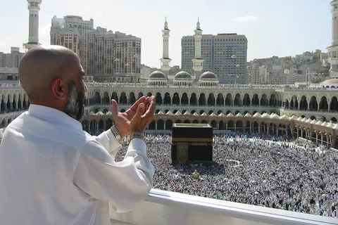 Supplicating Pilgrim at Masjid Al Haram . Mecca , Saudi Arabia .