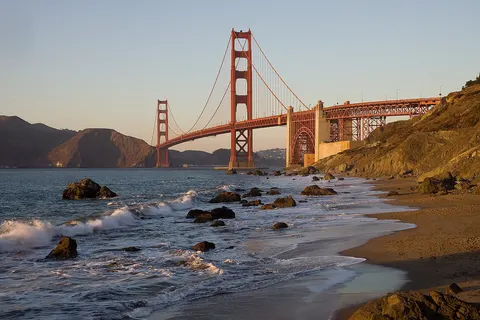 The Golden Gate Bridge in San Francisco as seen from the northern end of Baker Beach .