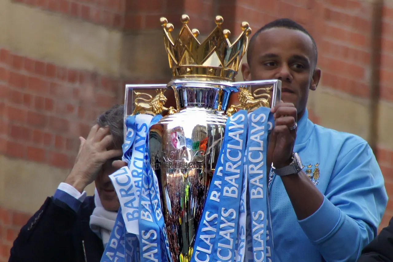 Vincent Kompany, Roberto Mancini in background.