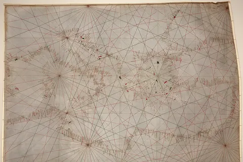 Anonymous nautical chart in portolan style probably drawn in Genoa. Covers Mediterranean Sea from the Balearic Islands to the Levantine coast; also covers western part of Black Sea. Oldest original cartographic artifact in the Library of Congress. Title from printed label on box in which the map is housed. Pen-and-ink (red/green/brown). Matted and mounted between sheets of transparent lucite. Sheet cut into the shape of an irregular rectangle. Imperfect: Vertically fold-lined at center, cracked, annotated in pencil on verso. Includes bar scale with unidentified divisions. The green rhumb lines on the recto are also visible on the verso. Scale [ca. 1:5,500,000].