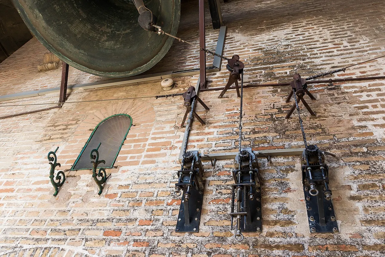 How to ring bells with electric motors, Giralda tower, Seville, Spain.
