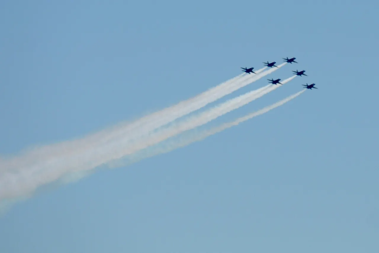 The U.S. Navy Blue Angels and the U.S. Air Force Thunderbirds Air Demonstration Squadron continued their America Strong Tour on May 2, 2020 above Atlanta. America Strong is a joint effort from the Navy and Air Force to recognize healthcare workers, first responders, and other essential personnel during the COVID-19 pandemic. U.S. Army National Guard photo by Pfc. Isaiah Matthews