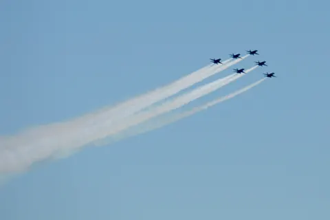 The U.S. Navy Blue Angels and the U.S. Air Force Thunderbirds Air Demonstration Squadron continued their America Strong Tour on May 2, 2020 above Atlanta. America Strong is a joint effort from the Navy and Air Force to recognize healthcare workers, first responders, and other essential personnel during the COVID-19 pandemic. U.S. Army National Guard photo by Pfc. Isaiah Matthews
