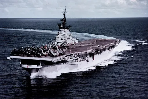 The U.S. Navy aircraft carrier USS Philippine Sea (CVA-47) makes a sharp turn to starboard, while steaming in the Western Pacific with the U.S. Seventh Fleet, 9 July 1955. Philippine Sea , with assigned Air Task Group 2 (ATG-2), was deployed to the Western Pacific from 1 April to 23 November 1955.