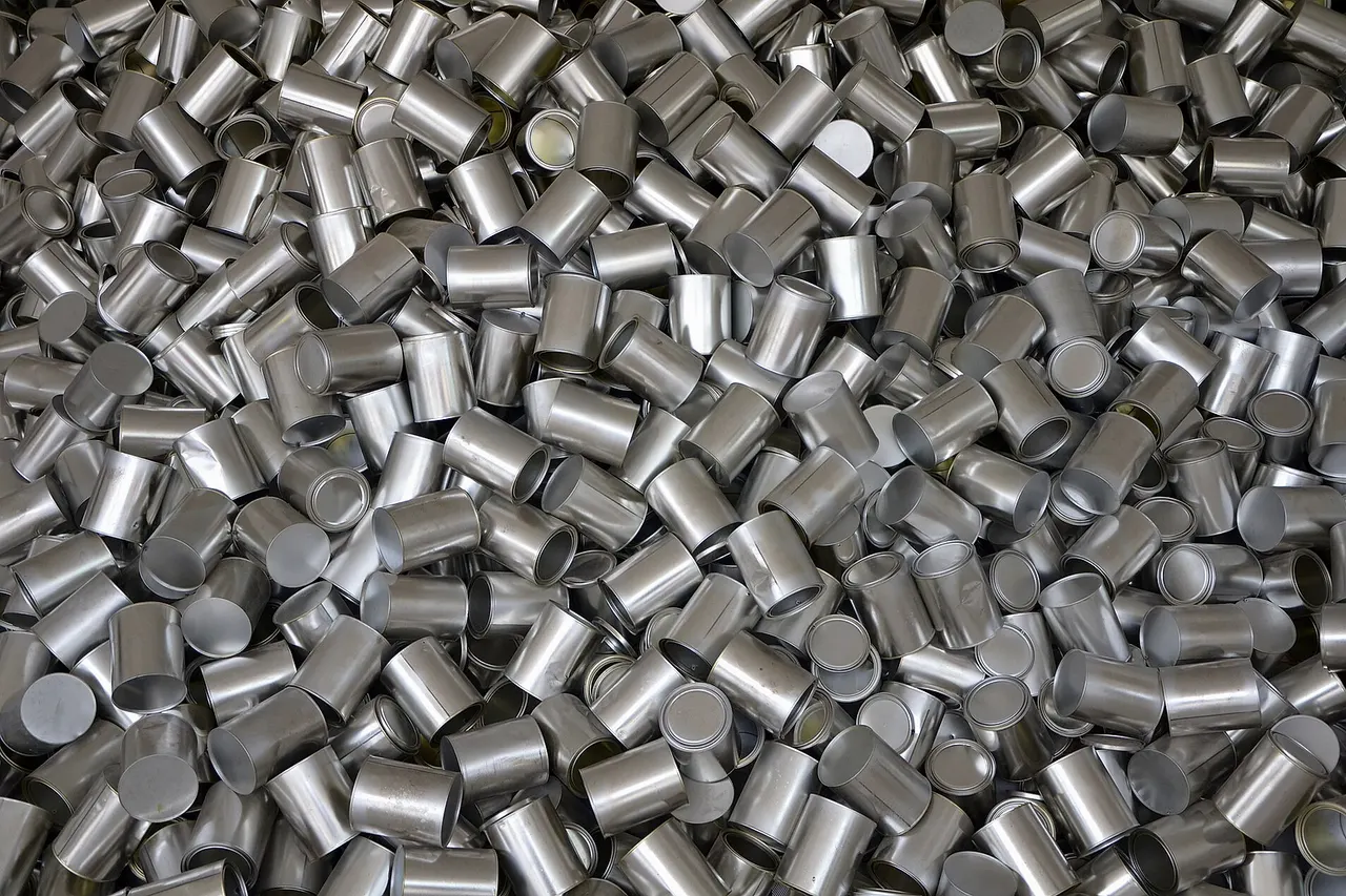 Heap of cans, symbolizing unrestrained consumption, outside the South Korea Pavilion of Expo 2015 in Milan.
