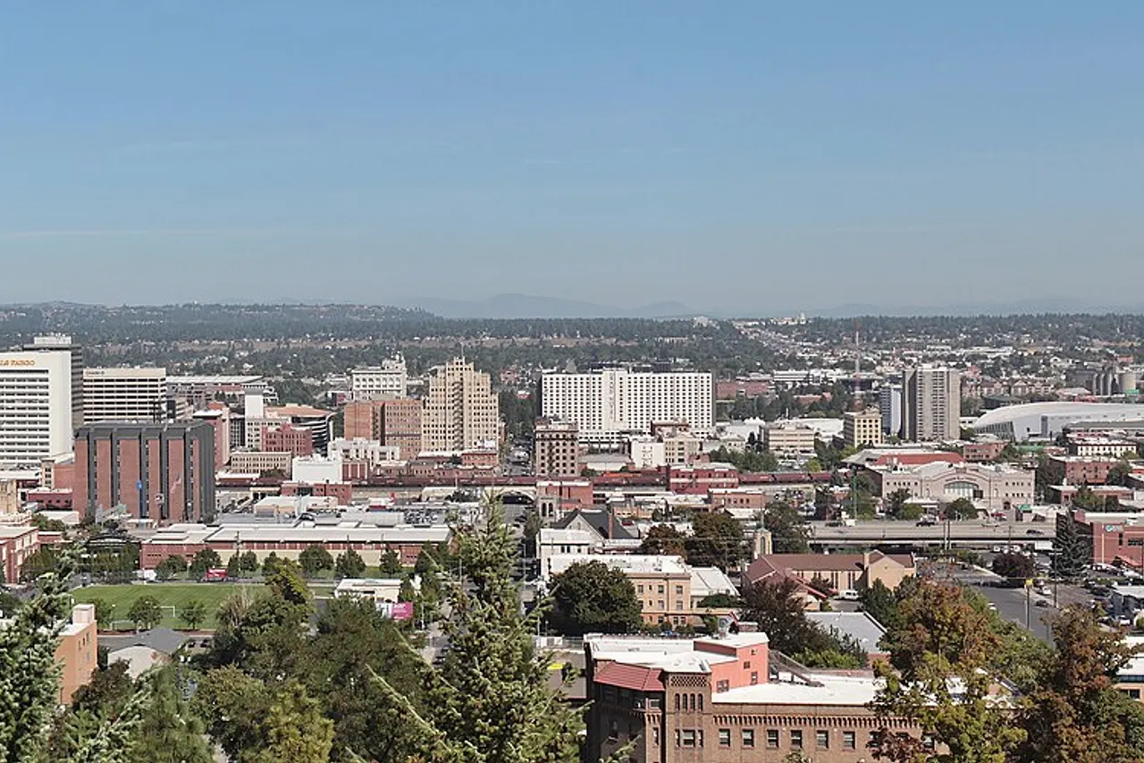 A panoramic view of the skyline of Spokane , the second largest city in the state of Washington, as seen from above Edwidge Woldson Park.
