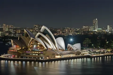 A exposure blended photo of the Sydney Opera House , as viewed from the Sydney Harbour Bridge . Taken by myself with a Canon 5D and 100mm f/2.8 macro lens.