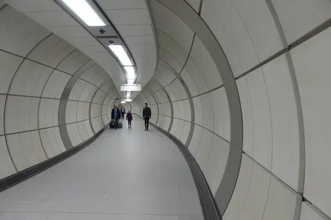 Bond Street station new connecting passage from Elizabeth line to the existing Underground station as seen on 25th October 2022, one day after opening.