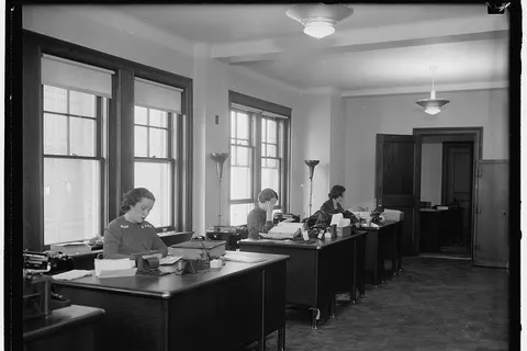 Title: Mine workers take new quarters. Washington, D.C., Dec. 27. The accounting division pictured above, was the first group of the United Mine Workers of America office force to establish [...] in the new U.M.W. building at 15th & Eye Sts. The building which was formerly occupied by the University Club, was taken over by the Mine Workers last summer and has just been given a complete renovation. The Mine Workers expect to fully occupy their new quarters soon after he first of the year Abstract/medium: 1 negative : glass ; 4 x 5 in. or smaller