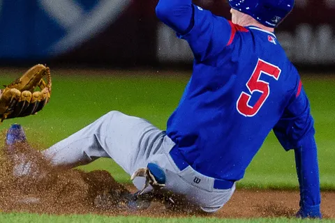 Pete Crow-Armstrong of the South Bend Cubs slides into second base during a 2022 game against the Lake County Captains.