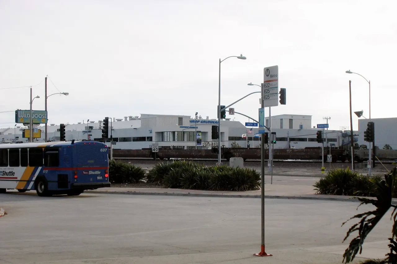 After landing at LAX we got a bus to Aviation, a station on the Metro Green Line . Across the street from the station is Northrop Grumman who are known for the F-14 Tomcat .