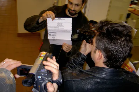 Voter displays a 2008 Michigan Republican Party primary ballot