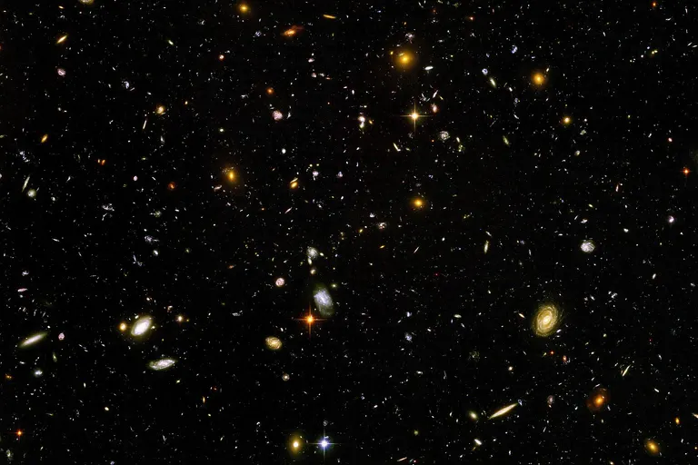 The Hubble Ultra Deep Field , is an image of a small region of space in the constellation Fornax, composited from Hubble Space Telescope data accumulated over a period from September 3, 2003 through January 16, 2004. The patch of sky in which the galaxies reside was chosen because it had a low density of bright stars in the near-field.
