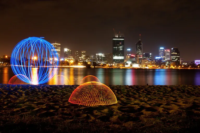 Light painting , orb and domes on the bank of the Swan River, Perth, Western Australia.