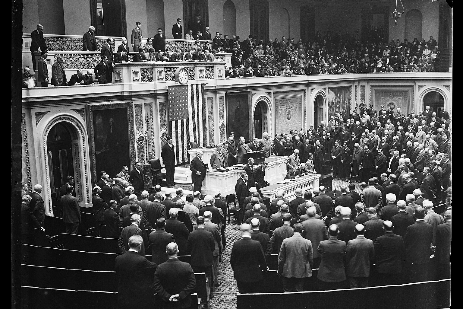 Title: Covering of extra session of Congress, scene in the House of Representatives today when Congress convened for special session called by President Hoover. The chaplain of the House Roy James Shera Montgomery, is shown delivering the opening prayer Abstract/medium: 1 negative : glass ; 4 x 5 in. or smaller