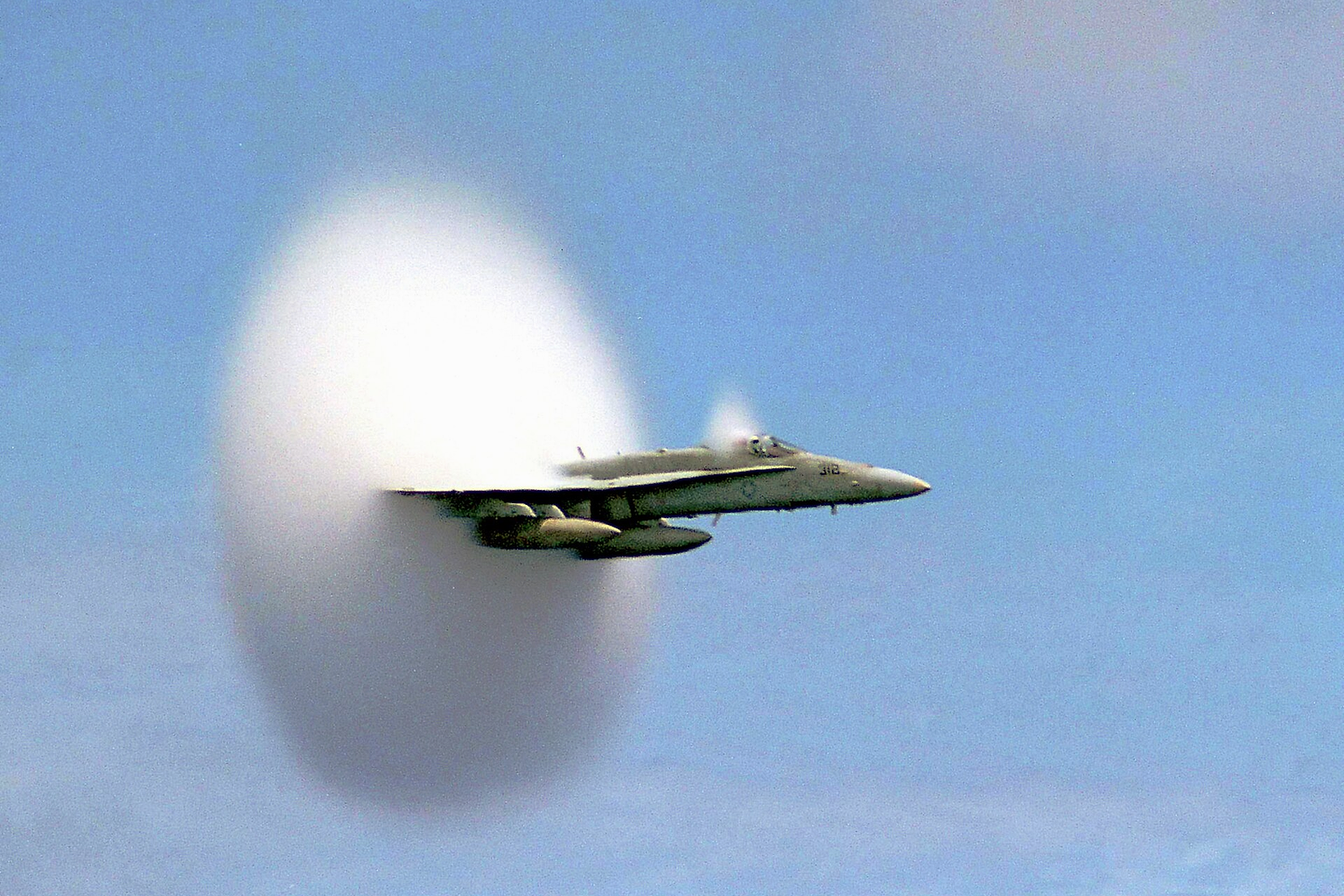 Off the coast of Pusan, South Korea: An F/A-18C Hornet assigned to Strike Fighter Squadron One Five One (VFA-151) breaks the sound barrier in the skies over the Pacific Ocean. VFA-151 is deployed aboard USS Constellation (CVN 64). The image was an Astronomy Picture of the Day on August 19, 2007 .