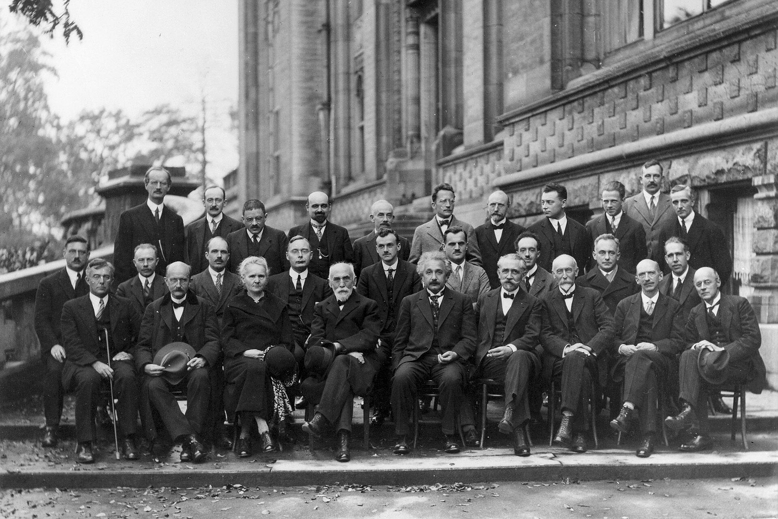 1927 Solvay Conference on Quantum Mechanics. Photograph by Benjamin Couprie, Institut International de Physique Solvay, Brussels, Belgium. From back to front and from left to right : Auguste Piccard , Émile Henriot , Paul Ehrenfest , Édouard Herzen, Théophile de Donder , Erwin Schrödinger , Jules-Émile Verschaffelt , Wolfgang Pauli , Werner Heisenberg , Ralph Howard Fowler , Léon Brillouin , Peter Debye , Martin Knudsen , William Lawrence Bragg , Hendrik Anthony Kramers , Paul Dirac , Arthur Compton , Louis de Broglie , Max Born , Niels Bohr , Irving Langmuir , Max Planck , Marie Skłodowska Curie , Hendrik Lorentz , Albert Einstein , Paul Langevin , Charles Eugène Guye, Charles Thomson Rees Wilson , Owen Willans Richardson This picture is also available with names at the bottom .