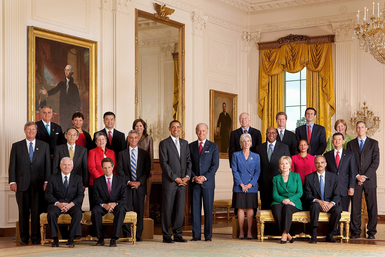 First Cabinet of President Barack Obama in the White House East Room . From left to right: Back row: Secretary of Transportation Ray LaHood , Administrator of the Environmental Protection Agency Lisa P. Jackson , Secretary of Commerce Gary Locke , Secretary of Labor Hilda Solis , President Barack Obama , Vice President Joe Biden , Secretary of Interior Ken Salazar , Secretary of Housing and Urban Development Shaun Donovan , Director of the Office of Management and Budget Peter R. Orszag , Chair of the Council of Economic Advisers Christina Romer , Secretary of Education Arne Duncan . Second row: Secretary of Agriculture Tom Vilsack , Secretary of Energy Steven Chu , Secretary of Homeland Security Janet Napolitano , Chief of Staff Rahm Emanuel , Secretary of Health and Human Services Kathleen Sebelius , United States Trade Representative Ron Kirk , United States Permanent Representative to the United Nations Ambassador Susan Rice , Secretary of Veteran Affairs Eric Shinseki . Third row, sitting: Secretary of Defense Robert Gates , Secretary of Treasury Timothy F. Geithner , Secretary of State Hillary Rodham Clinton , Attorney General of the United States Eric Holder .