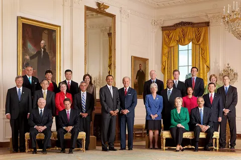 First Cabinet of President Barack Obama in the White House East Room . From left to right: Back row: Secretary of Transportation Ray LaHood , Administrator of the Environmental Protection Agency Lisa P. Jackson , Secretary of Commerce Gary Locke , Secretary of Labor Hilda Solis , President Barack Obama , Vice President Joe Biden , Secretary of Interior Ken Salazar , Secretary of Housing and Urban Development Shaun Donovan , Director of the Office of Management and Budget Peter R. Orszag , Chair of the Council of Economic Advisers Christina Romer , Secretary of Education Arne Duncan . Second row: Secretary of Agriculture Tom Vilsack , Secretary of Energy Steven Chu , Secretary of Homeland Security Janet Napolitano , Chief of Staff Rahm Emanuel , Secretary of Health and Human Services Kathleen Sebelius , United States Trade Representative Ron Kirk , United States Permanent Representative to the United Nations Ambassador Susan Rice , Secretary of Veteran Affairs Eric Shinseki . Third row, sitting: Secretary of Defense Robert Gates , Secretary of Treasury Timothy F. Geithner , Secretary of State Hillary Rodham Clinton , Attorney General of the United States Eric Holder .