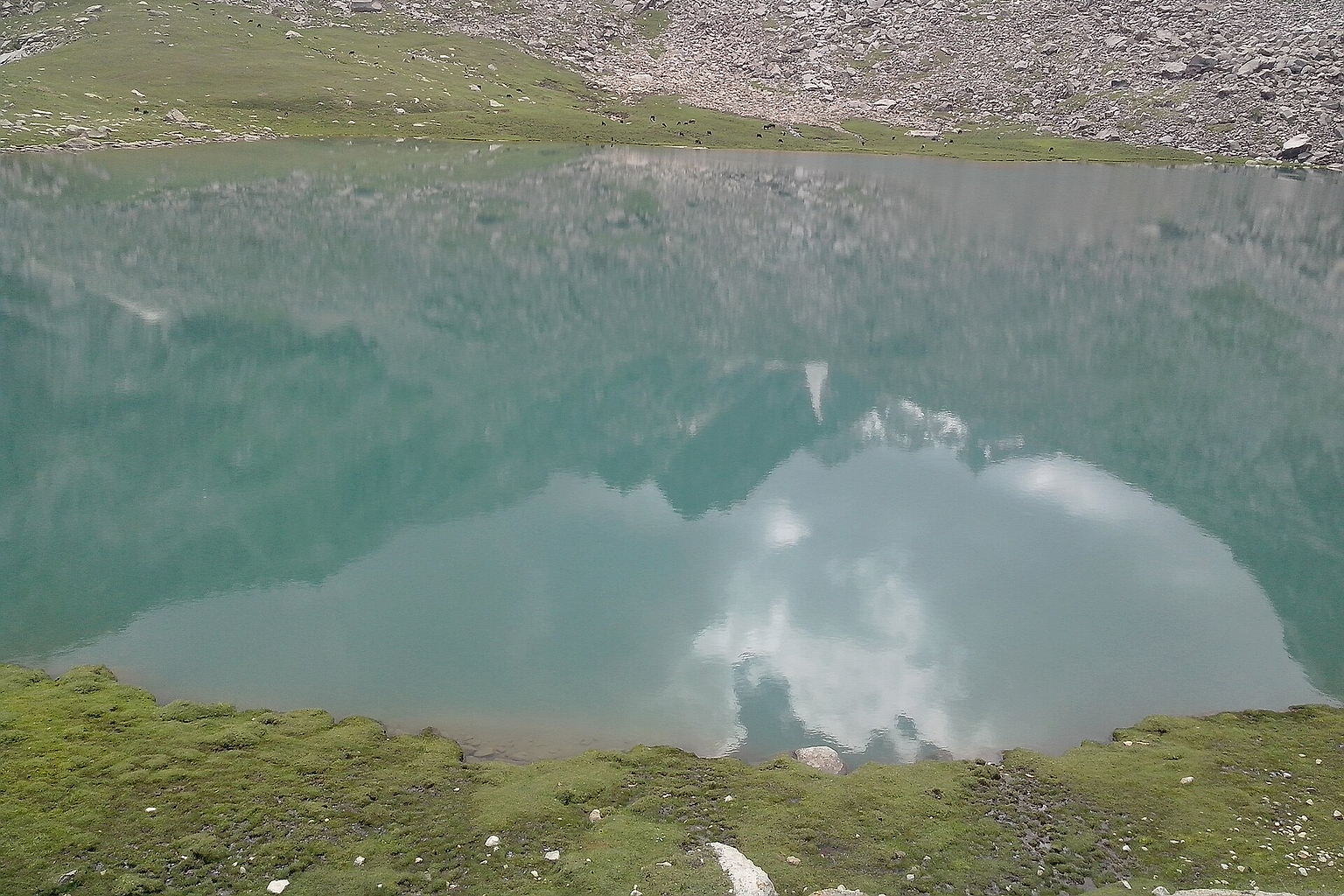 This Image has been captured at a height of 7000ft above sea level. its a natural lake having a crystal clear water to act like a mirror bestowing more beauty to the scenery.