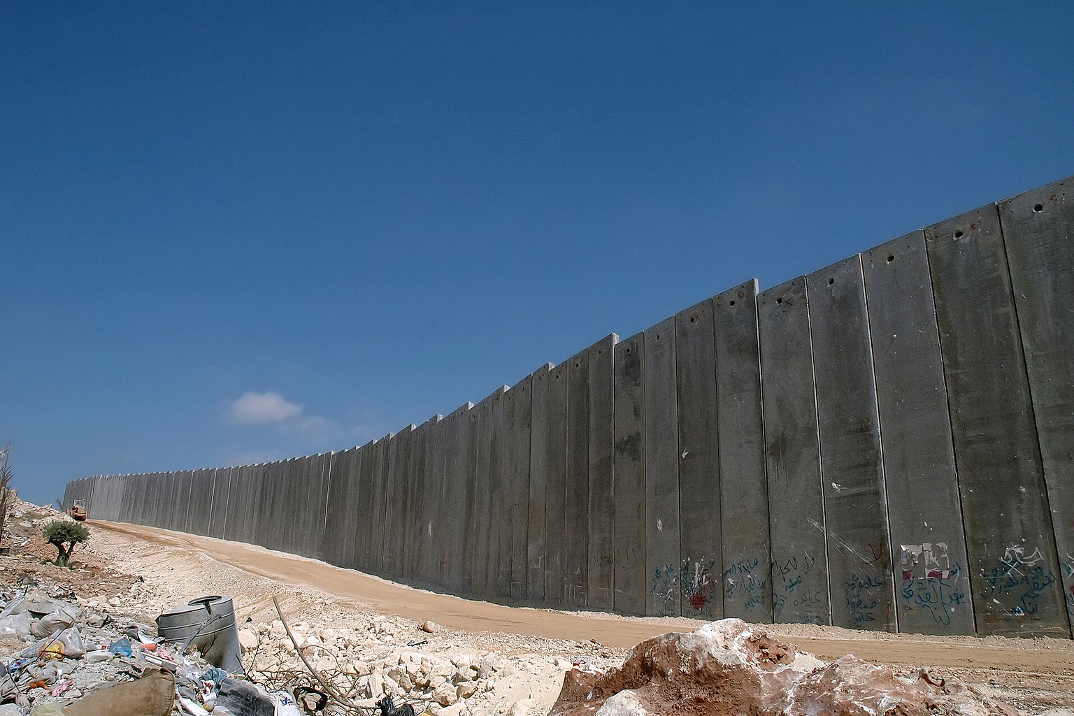 Israel's "Security Fence", "West Bank Barrier", is a solid wall along 5% of its length. 10 metres high and reinforced concrete.