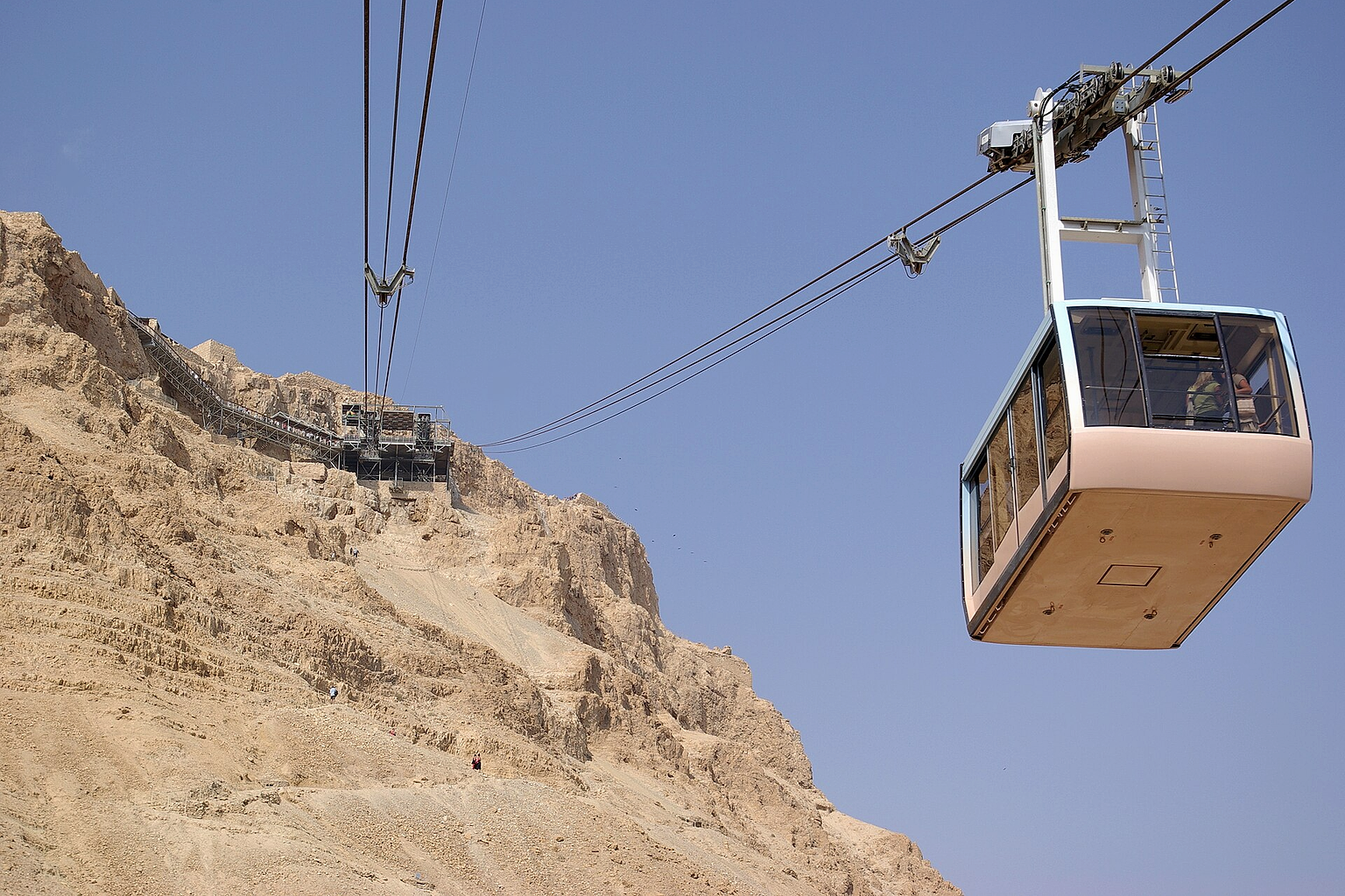 Photo of the aereal Ropeway leading to Masada in Israel .
