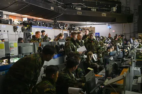 U.S. and Republic of Korea service members work in the Air Operations Command during the Ulchi Freedom Shield 25 exercise at Osan Air Base, Republic of Korea, Aug. 20, 2025. Through rigorous, realistic combat simulations, UFS25 builds combat readiness and sharpens allied response capabilities. (U.S. Air Force photo by Staff Sgt. Joshua LeRoi)