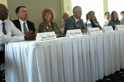 Junie Christian, the executive director of the Onslow Women's Shelter, answers questions at Marine Corps Base Camp Lejeune's Domestic Violence Summit recently. To reach help in the Marine Corps Base Camp Lejeune area 24 hours a day call the domestic violence helpline at 750-5852. To reach the National Domestic Violence Hotline call 800-799-SAFE. For life threatening emergencies, call 911 or go to the nearest hospital.