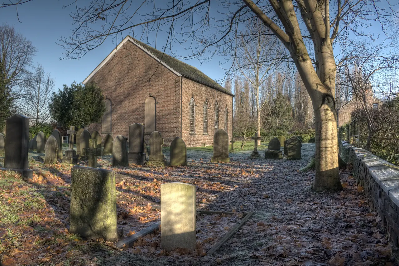 The rear and side of St George's Church in Carrington, Greater Manchester. The front of the church, while containing a nice window, was in the shade and there isn't the option to get a good shot with the lack of space. Viewed from the south.