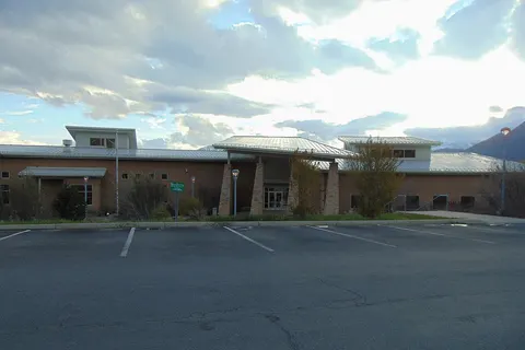 The east side of the Utah Valley University Wasatch Campus building, located just east of U.S. Route 40/U.S. Route 189 in northwestern Wasatch County, Utah, just over 2 miles (3.2 km) north of Heber City, April 2016