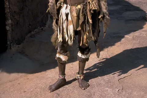 Witch doctor of the Shona people close to Great Zimbabwe, Zimbabwe. Kodak photo CD from slide.