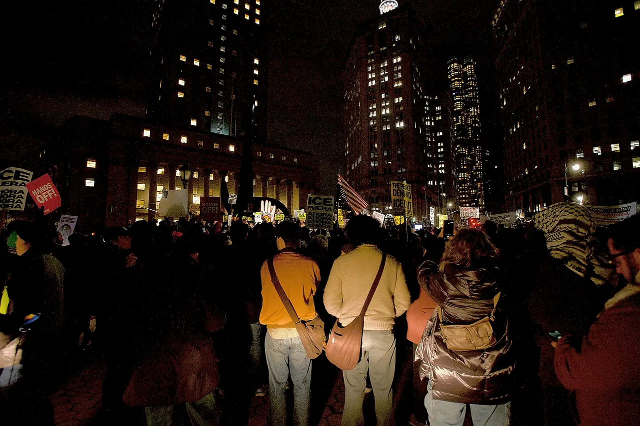 Protesters at Foley Square by the federal government building protesting the ICE killing of Renee Good hours earlier. People spoke at the monument, before walking around 26 Federal Plaza, and ending back at Foley Square.