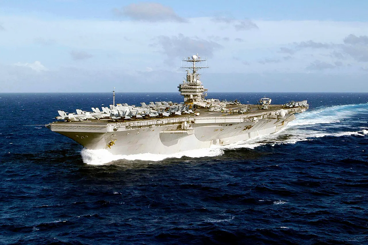 The U.S. Navy aircraft carrier USS Abraham Lincoln (CVN-72) underway in the Western Pacific on 21 December 2004. Abraham Lincoln , with assigned Carrier Air Wing 2 (CVW-2), was deployed to the Western Pacific 15 October 2004 to 4 May 2005.