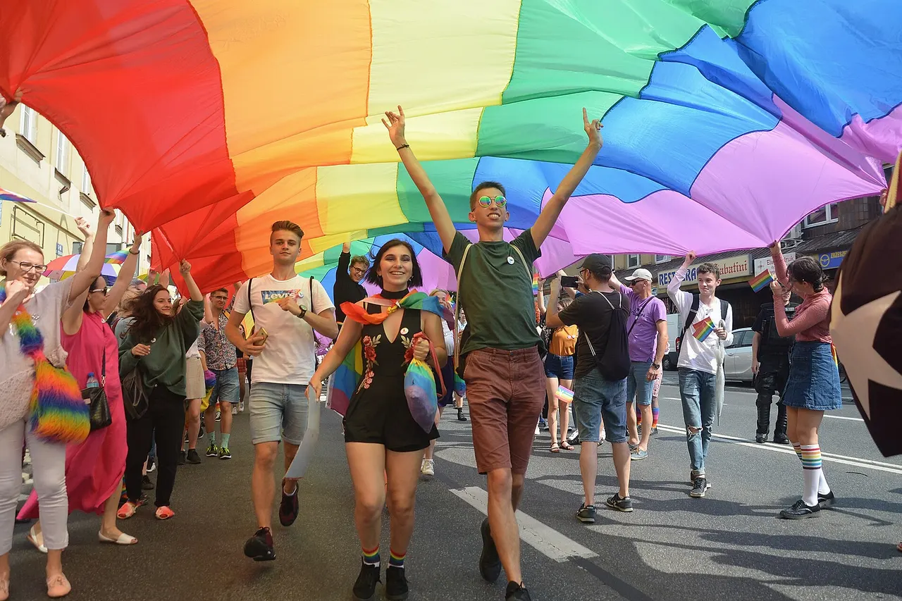 This photograph, captured during the Pride March in Rzeszów, Poland, has transcended its original documentary purpose. While it stands as a testament to the courage and joy of a generation demanding change, it has also been cynically appropriated by outlets such as The Spectator to serve as a backdrop for anti-LGBTQ+ polemics. As the author, I find the use of this image to illustrate narratives that question the very presence of these individuals in public spaces to be a gross violation of journalistic integrity. To take the genuine smiles of people who trusted me and turn them into a "visual target" in an ideological war is a perverse manipulation of context. This image is not a "stock photo" for political agendas; it is a record of human dignity. Any attempt to use it to undermine the rights or safety of the community it depicts is a betrayal of the truth I captured. [ https://spectator.com/article/parenting-writer-take-your-kid-to-a-pride-parade/ Parenting writer: take your kid to a Pride parade!, Cockburn, 3 June 2022, 9:11am